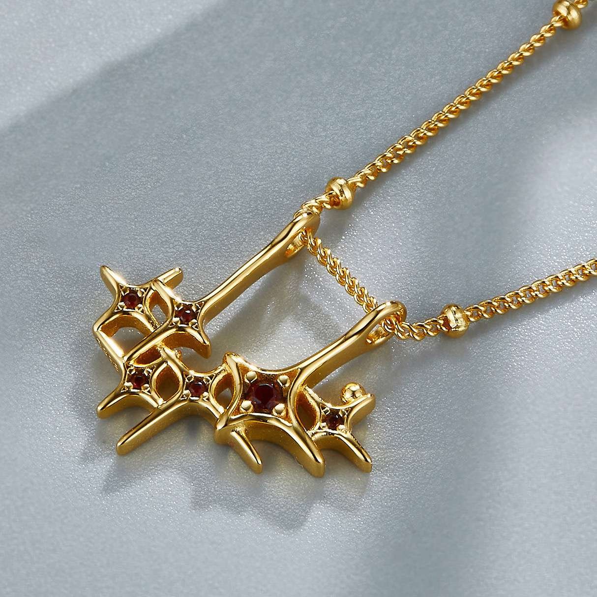 Garnet stars necklace